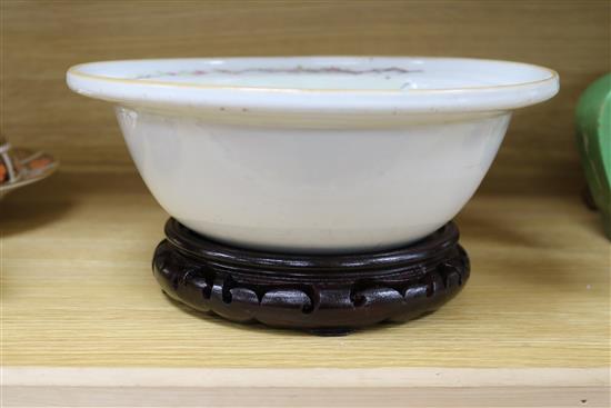 A Chinese famille rose basin, on wood stand height 12cm diameter 26cm